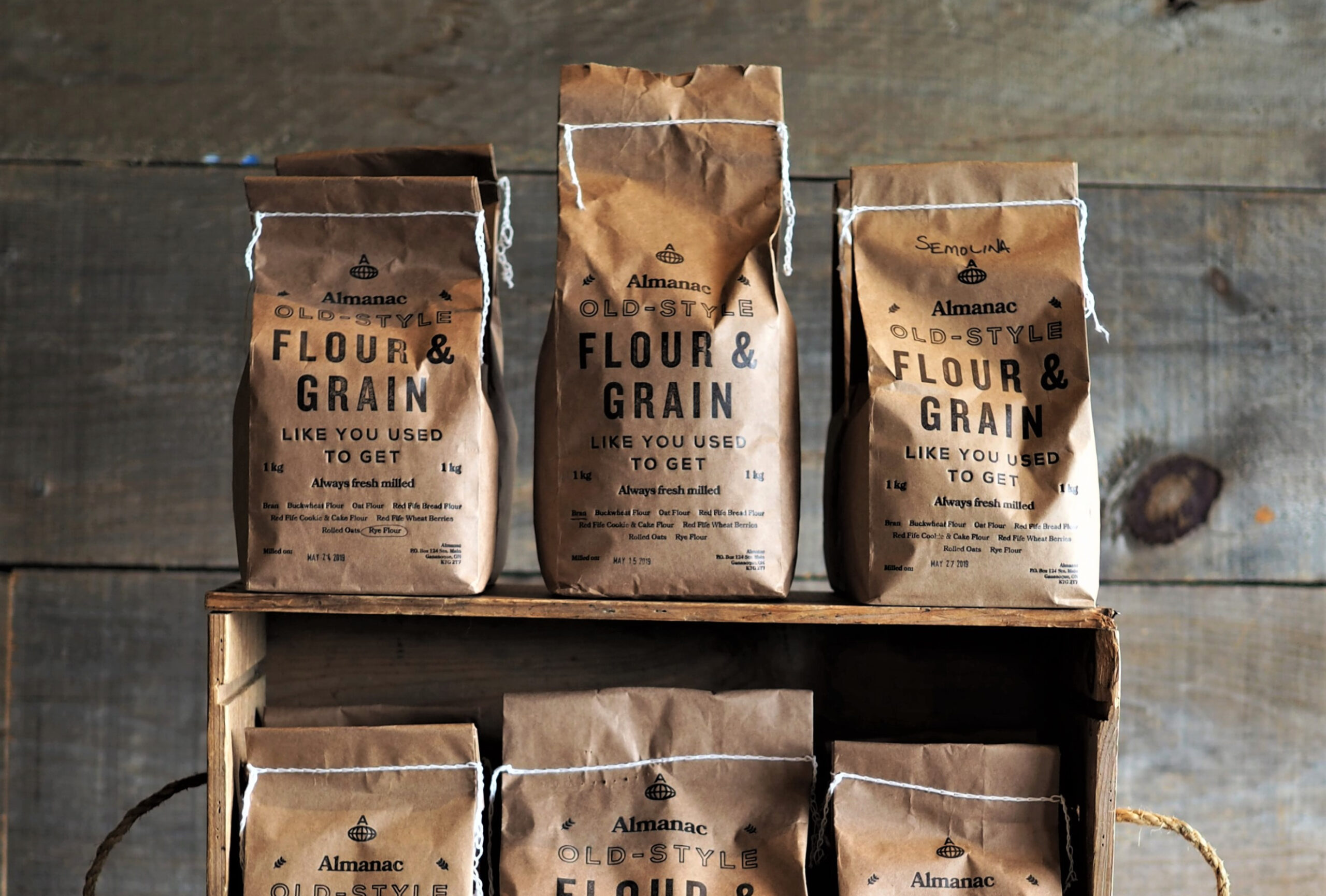 Promo image: Almanac flour packaging on display. 